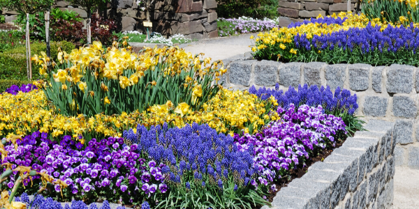 Raised stone garden bed installation