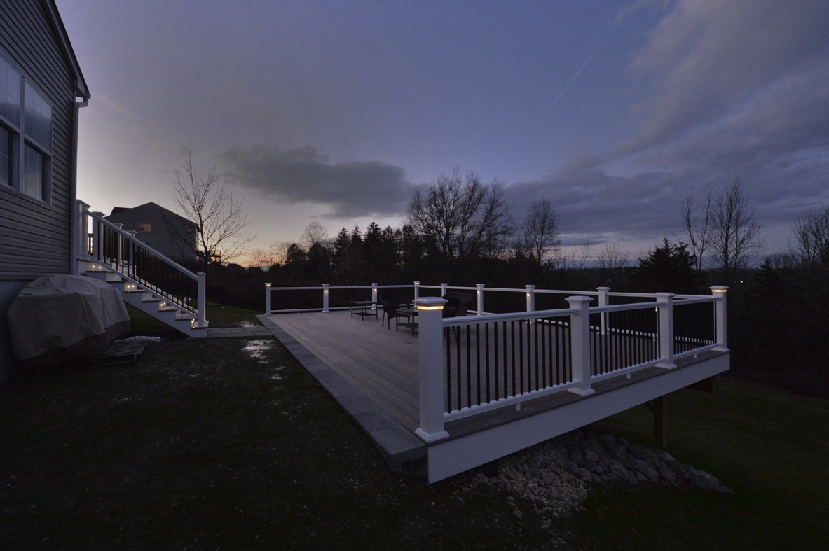 evening view of deck with custom lighting for safety
