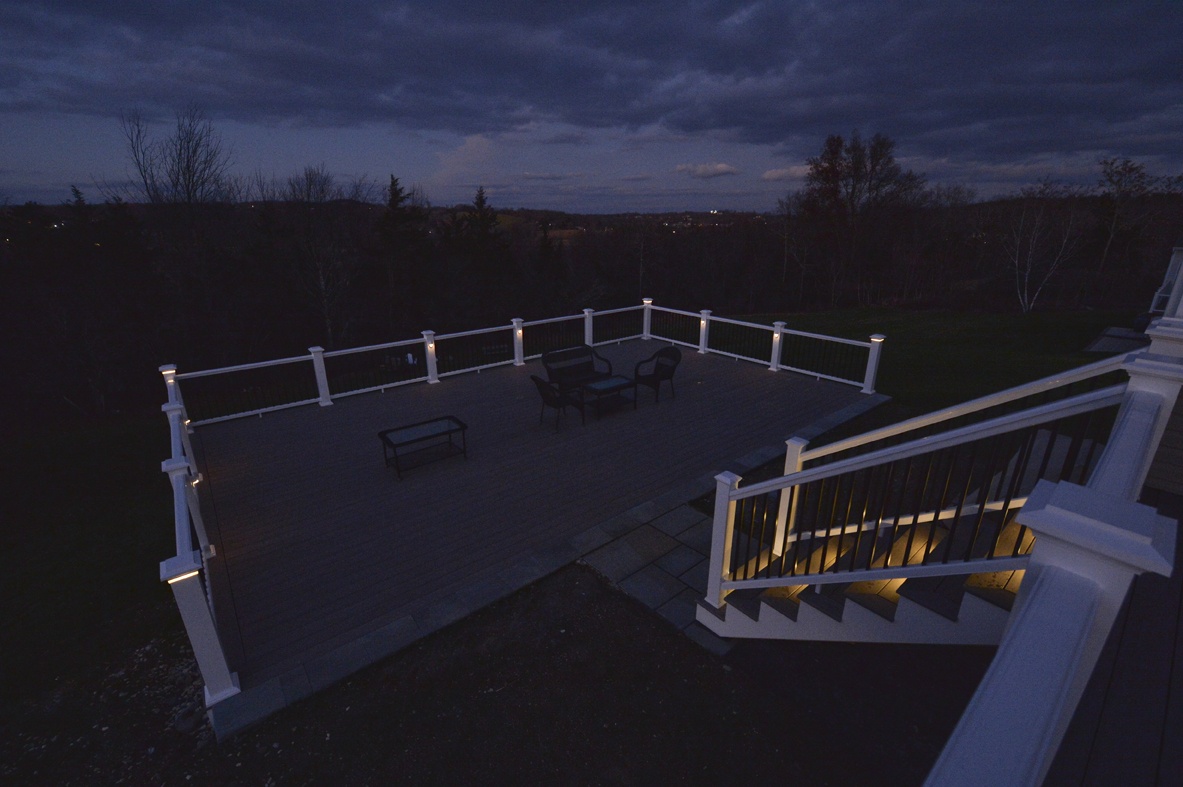 evening view of deck with custom lighting for safety